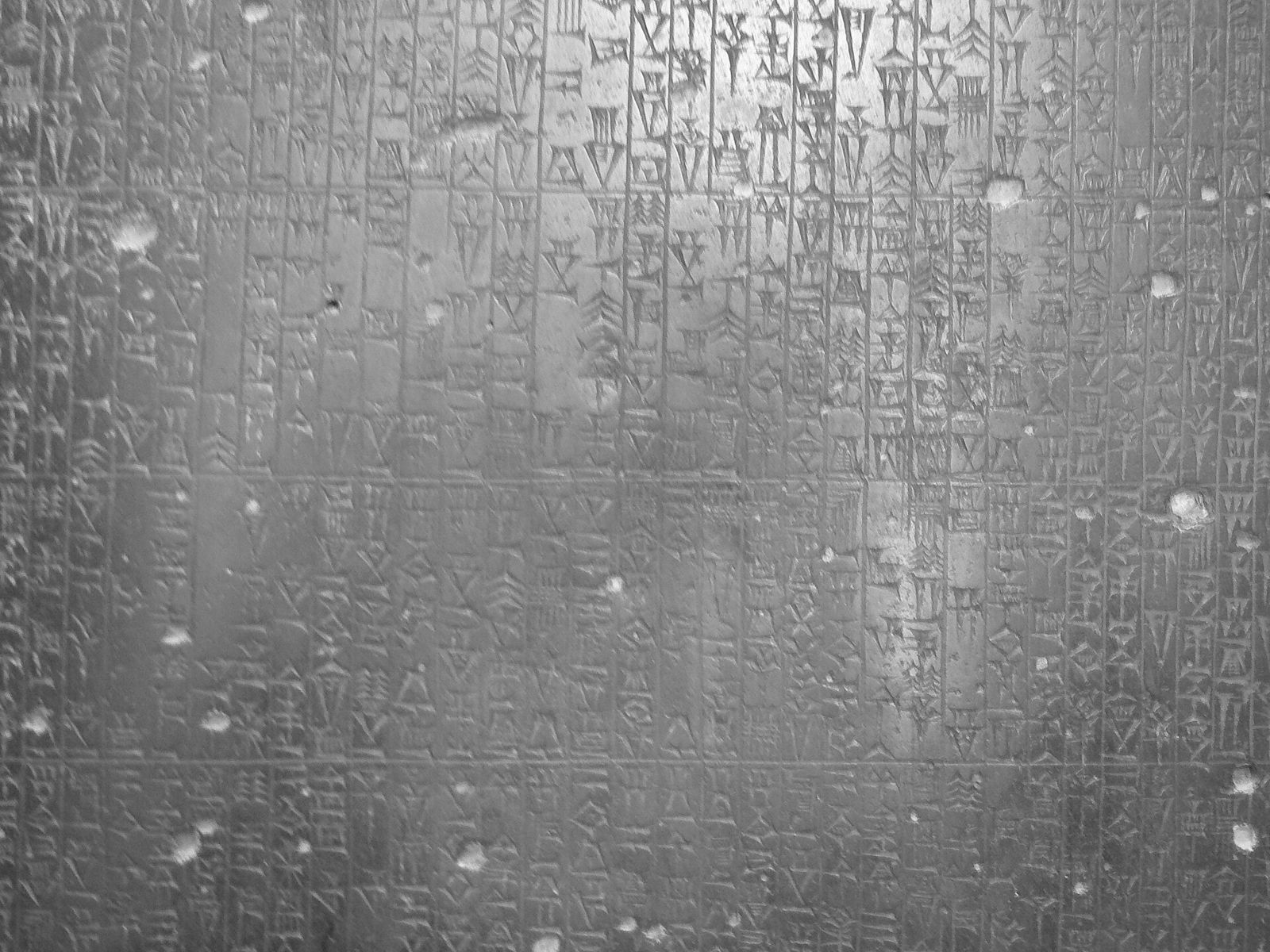 Close detail of the stele's cuneiform: rows of laws cut into black stone
