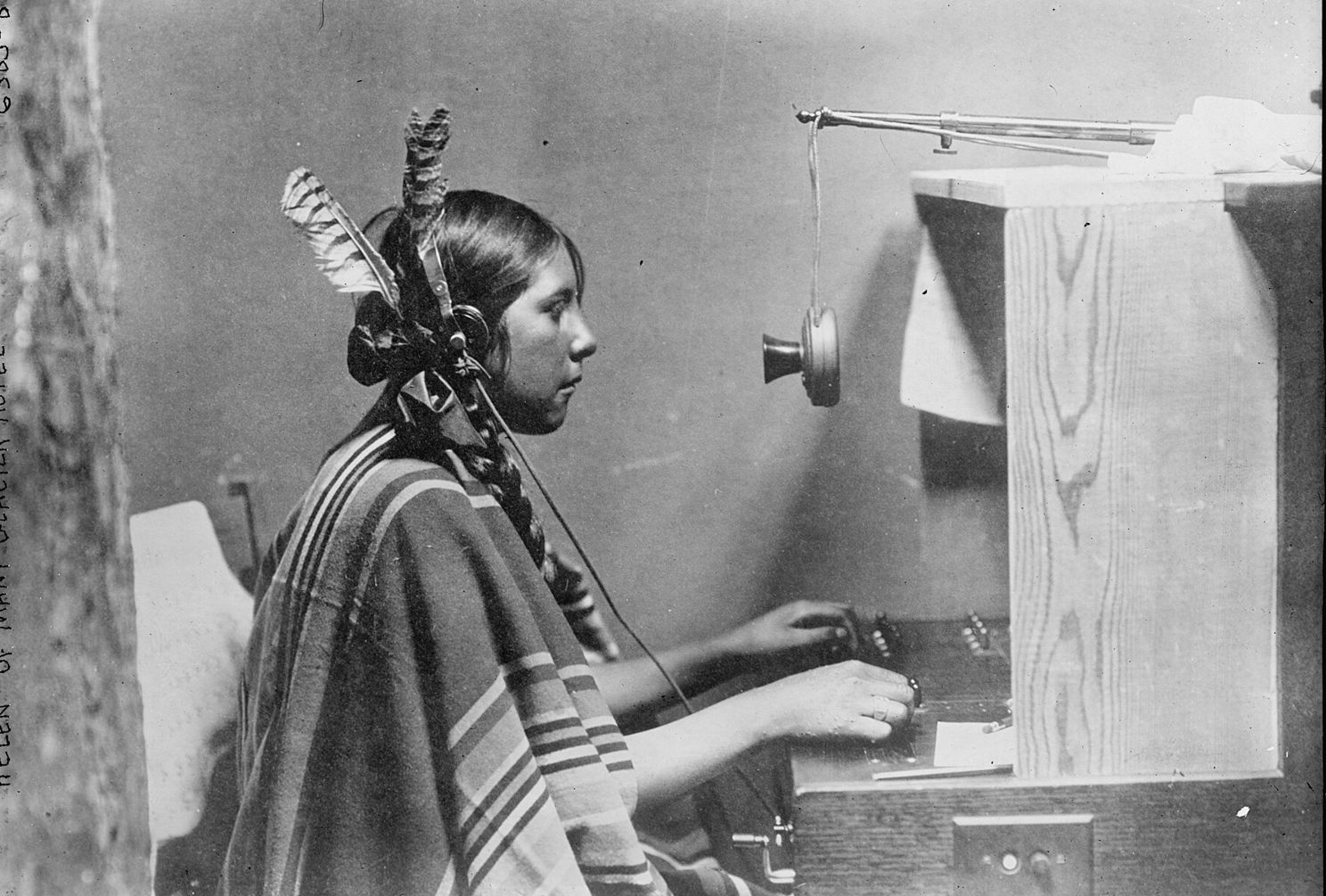 A telephone switchboard operator at work, 1925